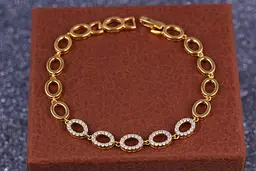Браслет Xuping Jewelry п'ять фианитових овалів 19 см 7 мм золотистий