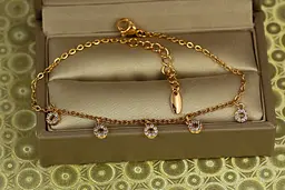 Браслет Xuping Jewelry з підвісками п"ять бубликів 17 см подовжувач 3 см золотистий