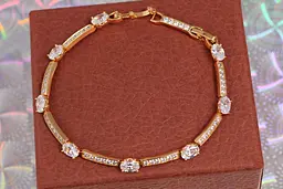 Браслет Xuping Jewelry доріжки з білими овальними каменями 20 см 5 мм золотистий