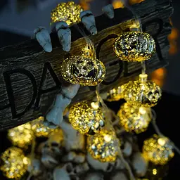 Гирлянда на Хэллоуин Тыквы 10 led 150 см 55 мм золотистая - миниатюра 3