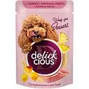 Вологий корм для собак Delickcious Пластівці з індичкою та тропічними фруктами у вершковому соусі 85 г