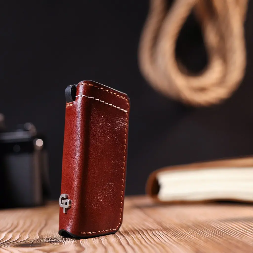 Зручна шкіряна ключниця Grande Pelle 11392 коричневий - фото 8