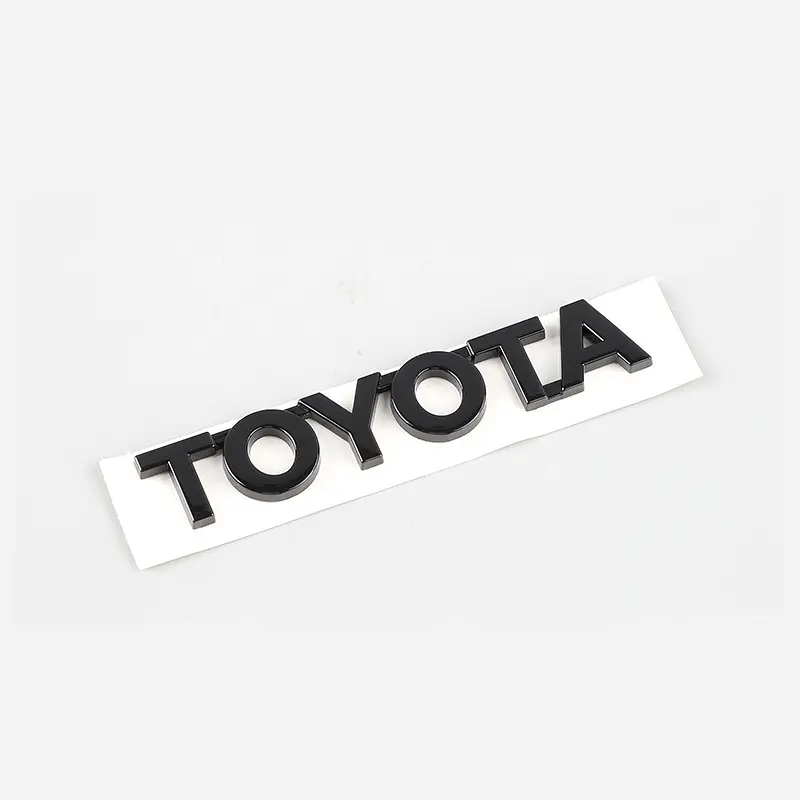 Емблема напис Toyota глянцева Чорна 115х20 мм Пластик на скотчі (логотип шиїльдик) (Завод) - фото 3