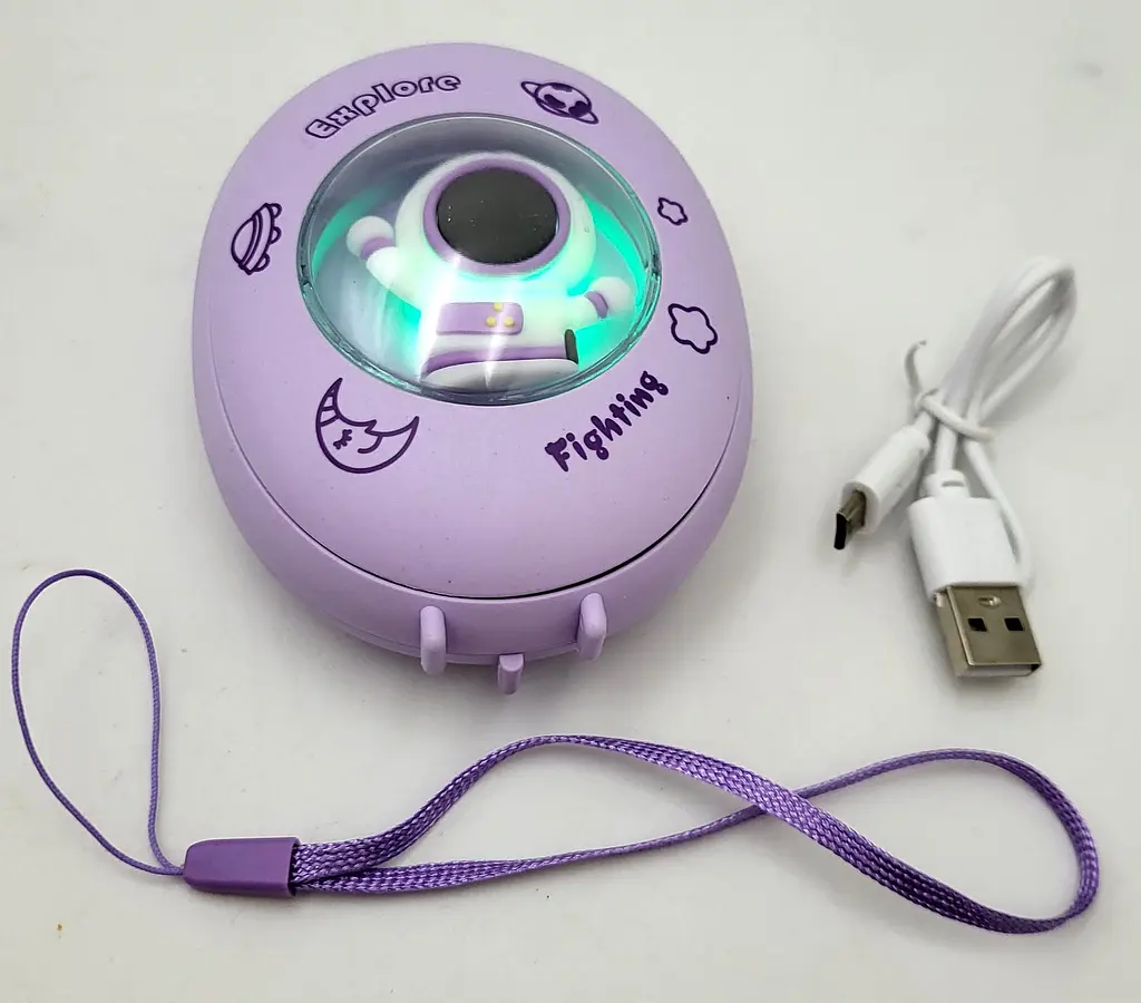 Кишенькова акумуляторна грілка обігрівач для рук нагрівач з USB зарядкою UKC AA21-1 фіолетовий - фото 5