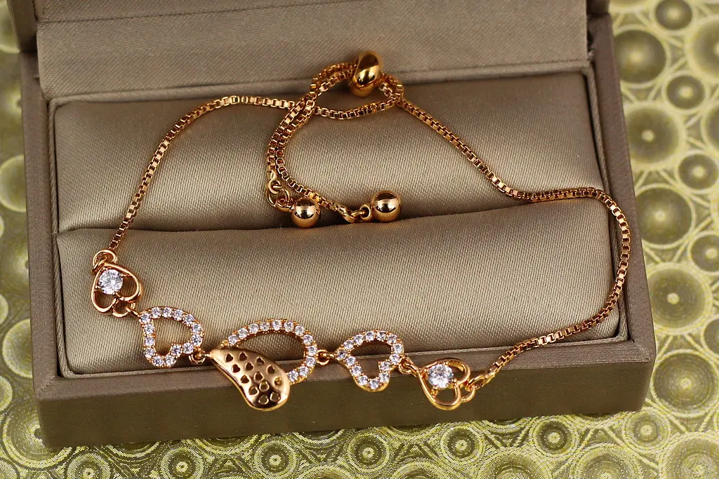 Браслет Xuping Jewelry регульований щаслива сім'я на бігунці золотистий
