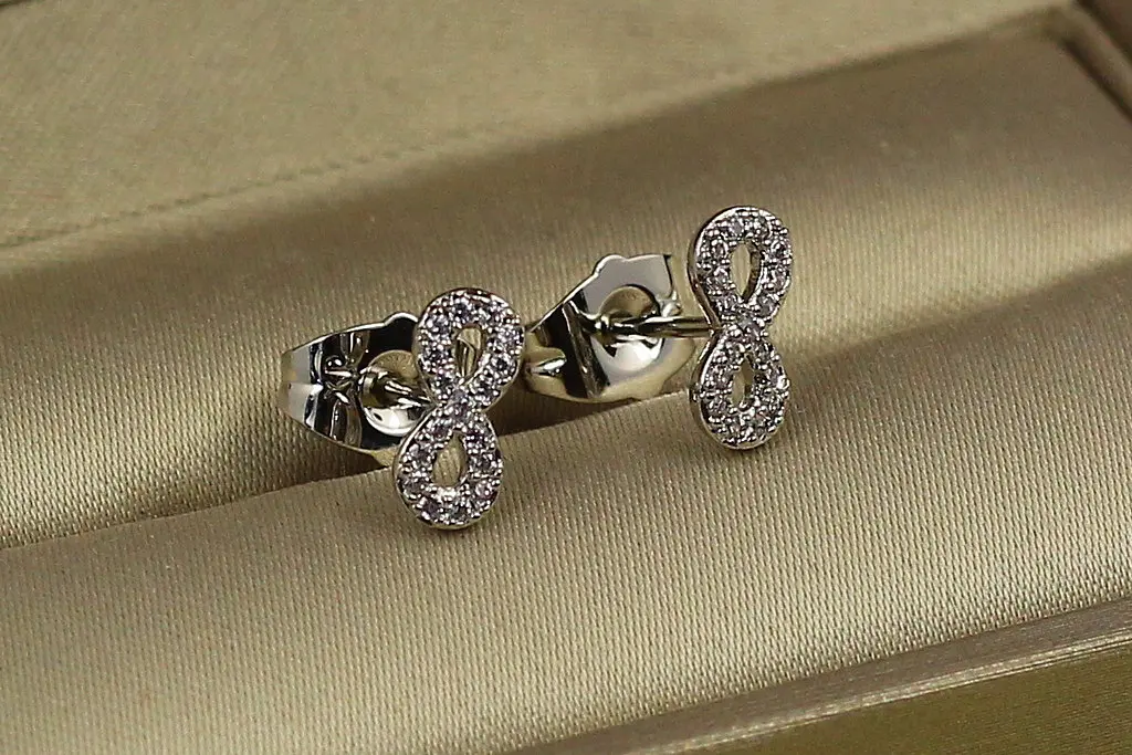 Сережки гвоздики Xuping Jewelry нескінченність із камінчиками 4 мм сріблясті - фото 2