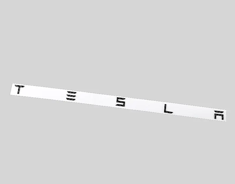 Емблема буквене позначення Tesla Сірий з Чорним Пластик на скотчі (букви) (Завод) - фото 2