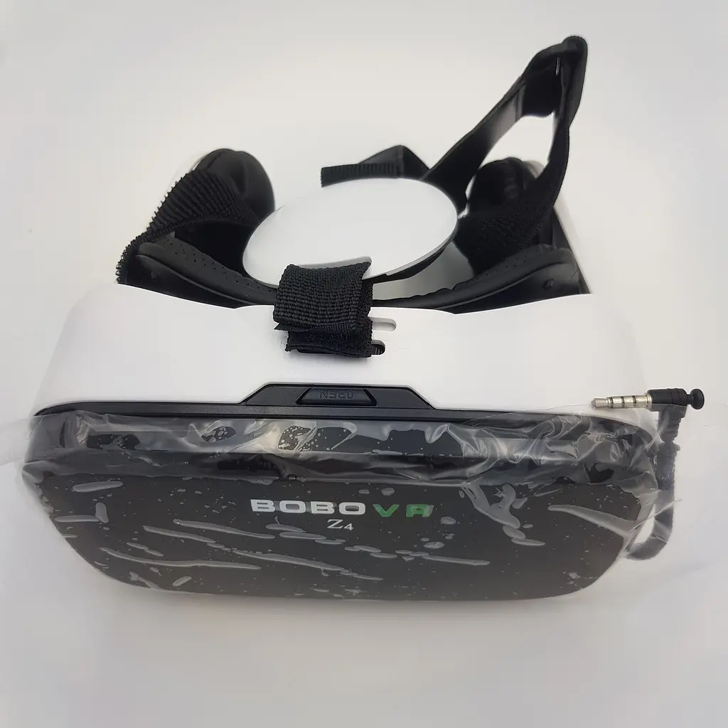 3D окуляри віртуальної реальності для смартфона з навушниками і пультом BOBO VR Z4 білий - фото 12