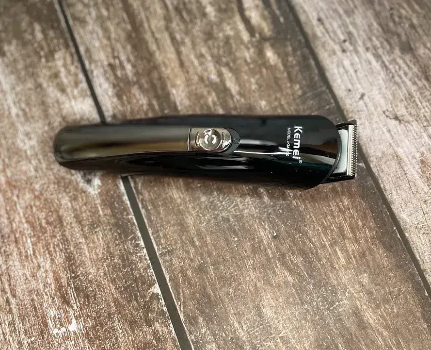 Багатофункціональний набір для стрижки Kemei KM-600 (11 в 1, з підставкою) - фото 3