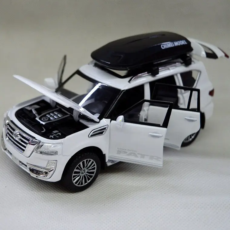 Колекційна металева модель автомобіля АвтоЕксперт Nissan Patrol з багажником на даху, інерцією, світлом та звуком 1:32 - фото 8