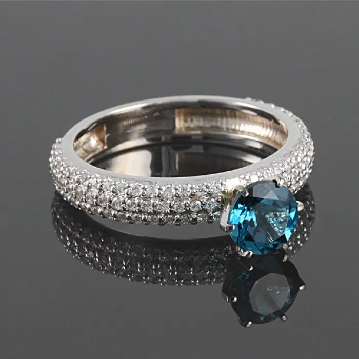 Каблучка з білого золота з топазом London Blue 20.5 K-0124