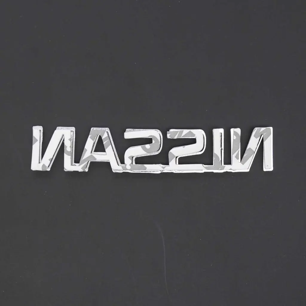 Емблема напис Nissan 120 x 22 мм скотч 3M - фото 2