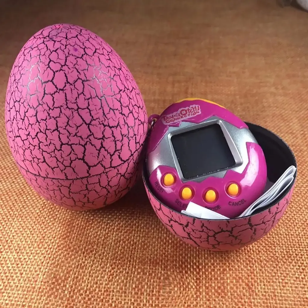 Игрушка-электронный питомец UFT Eggshell Game Pink Тамагочи в яйце динозавра розовая - фото 3