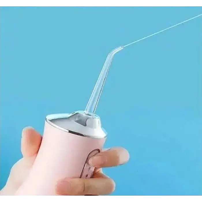 Ирригатор аккумуляторный Oral Irrigator S3J2 розовый, с 3 насадками для чистки зубов - фото 4