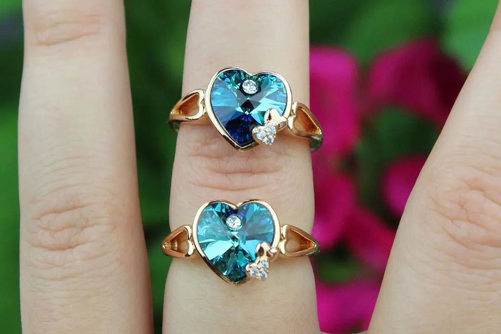 Кільце Xuping Jewelry сердечко Сваровскі блакитне в обідку р 17 золотисте - фото 2