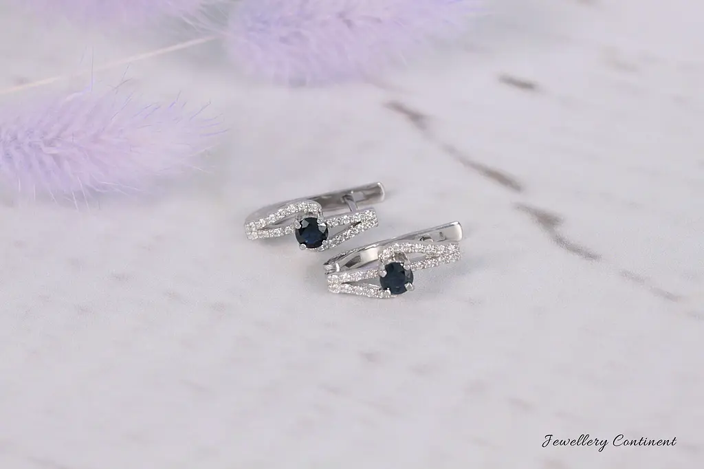 Сережки з білого золота з сапфірами і діамантами S-0057