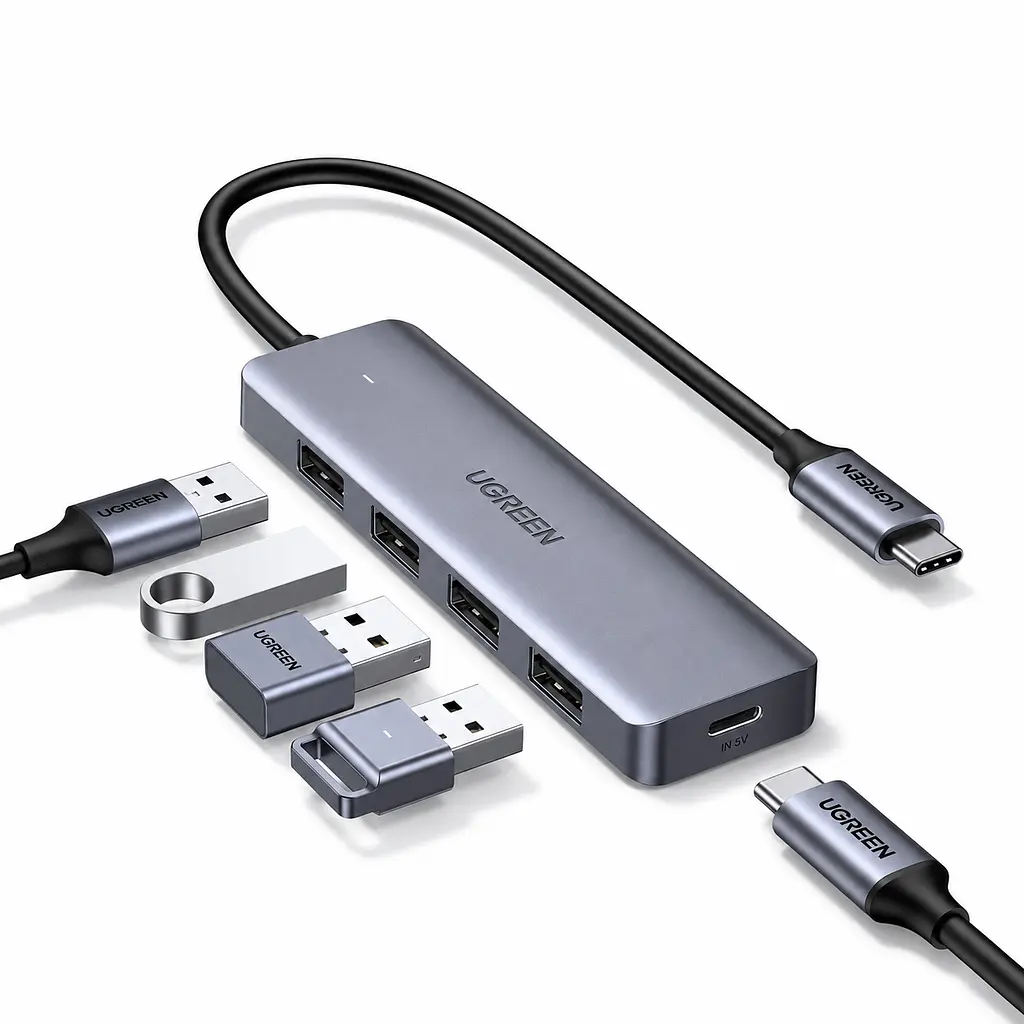 USB-хаб UGREEN CM219 концентратор з підключенням USB-C на 4 порти USB-A 3.0 передавання даних до 5 Гбіт/с з портом USB-C лише для додаткового живлення периферії для енергоємної периферії потрібен зарядний пристрій із підключенням до порту живлення USB-C Plug & Play для Windows macOS Linux для Android-пристроїв із USB-C та підтримкою OTG із захистом від перенапруги надструму та короткого замикання зі світлодіодним індикатором із вбудованим кабелем 0,15 м космічний сірий (70336)