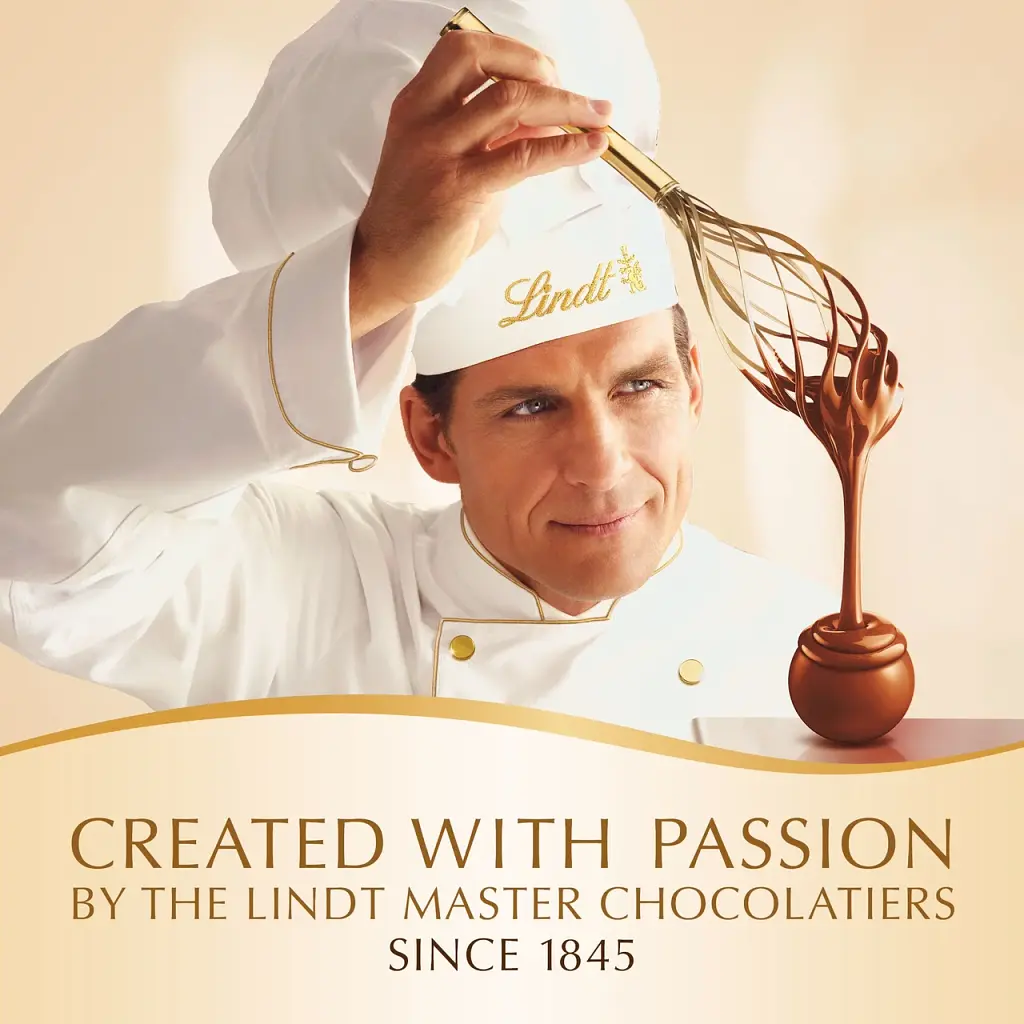 Шоколадні цукерки Lindt Lindor Holiday White Peppermint Truffles 24g - фото 3