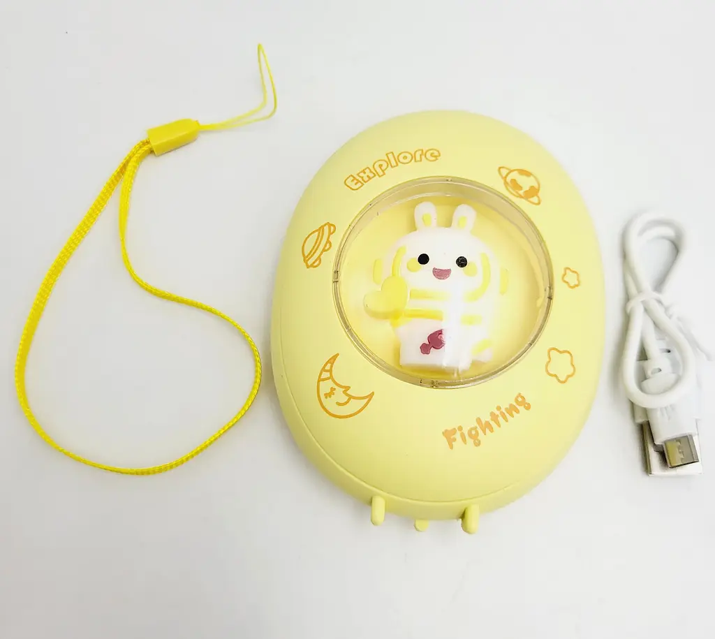 Кишенькова акумуляторна грілка обігрівач для рук нагрівач з USB зарядкою UKC AA21-1 жовтий - фото 4