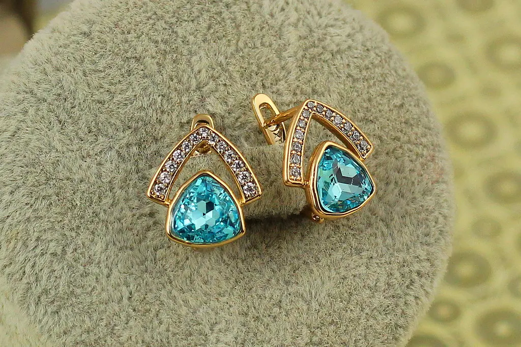 Сережки Xuping Jewelry Сваровскі будиночок із блакитним каменями 1,4 см золотисті