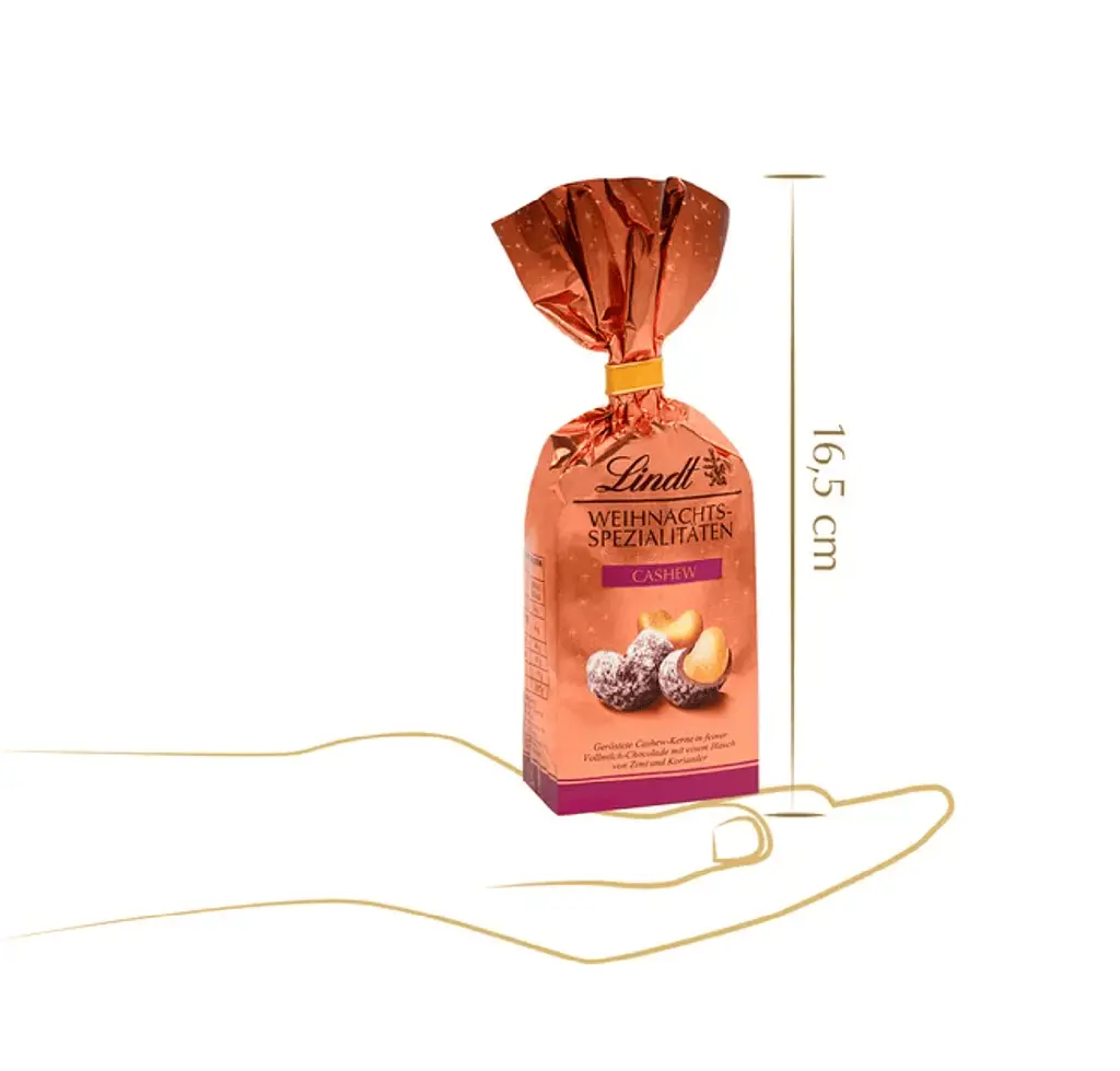 Шоколадні цукерки Lindt Weihnachts Spezialitaten Cashew 100г - фото 3