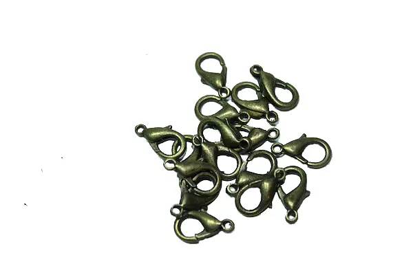 Карабіни маленькі різні кольори ≈1×0.7 см 50 шт. срібні - фото 2