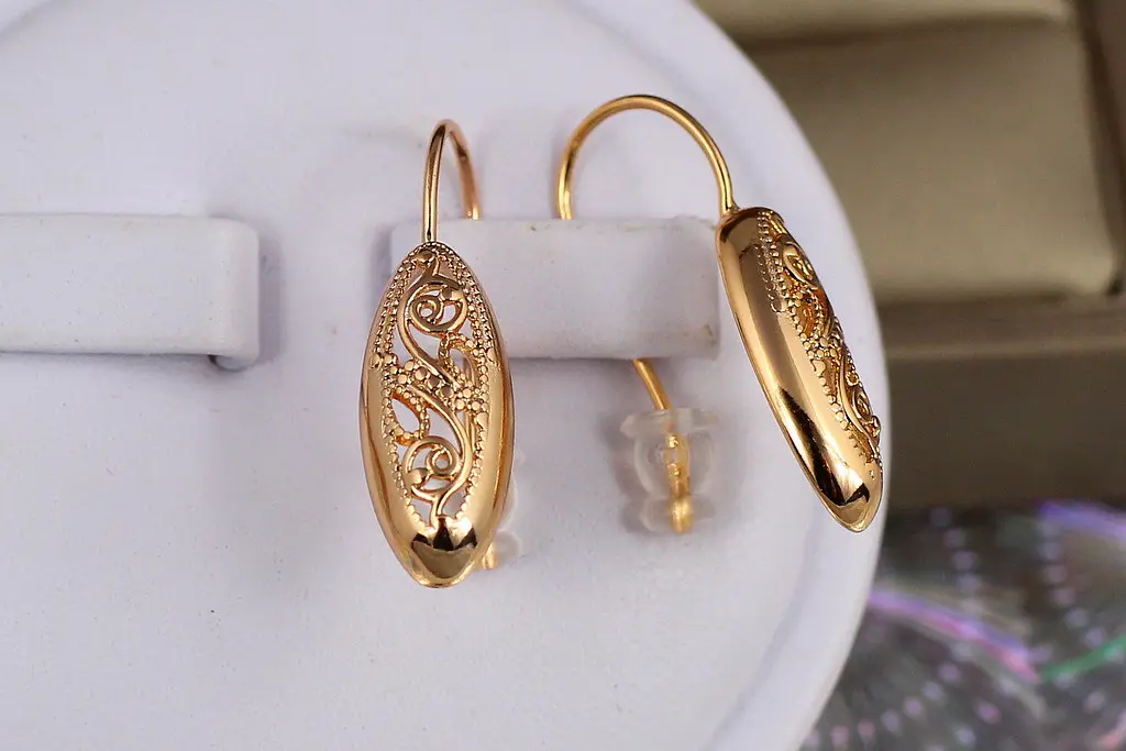 Сережки Xuping Jewelry овал із різьбленим візерунком 2.7 см золотисті