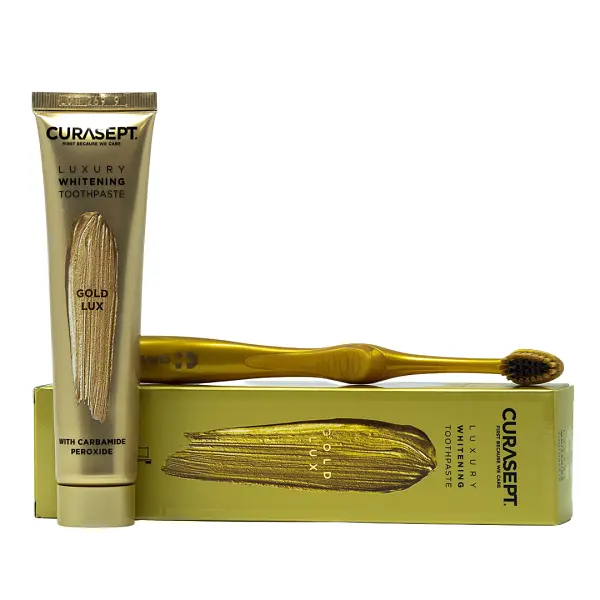 Зубна паста CURASEPT LUXURY WHITENING GOLD, відбілююча, 75 мл + зубна щітка, косметичка