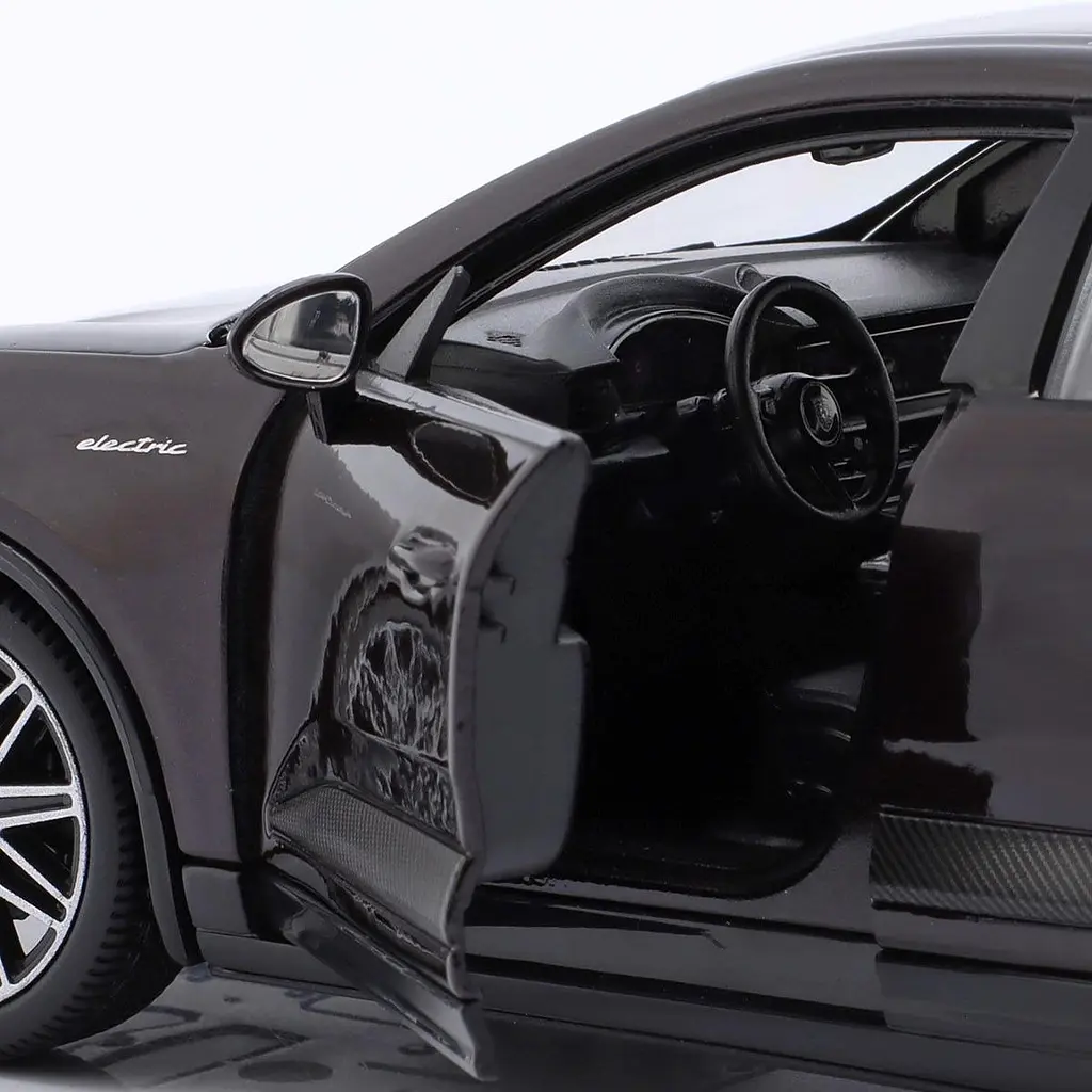 Автомодель - PORSCHE MACAN 4 ELECTRIC (чорний, 1:24) Bburago 18-21114 - фото 4