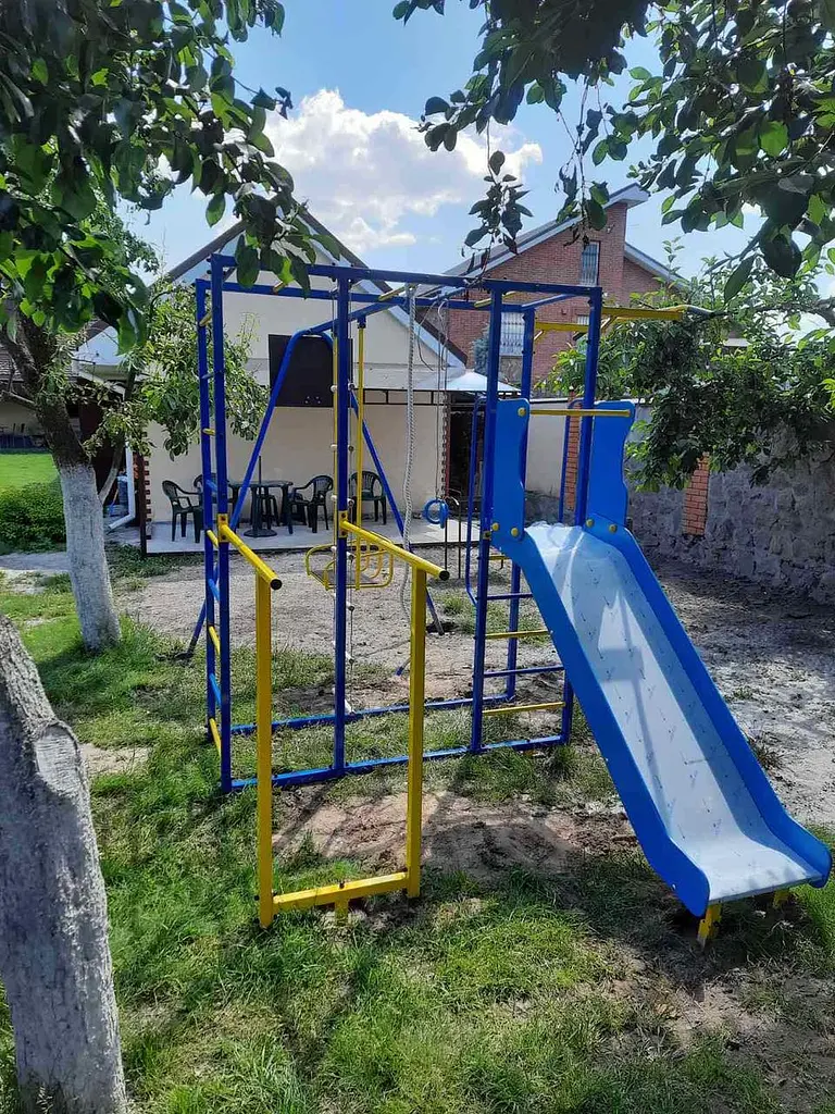 Дитячий спортивно-ігровий комплекс з гойдалкою і гіркою з нержавійки - фото 4