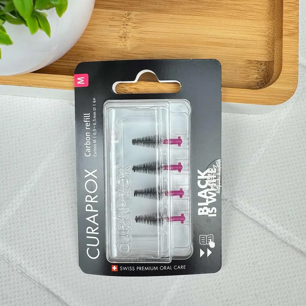 Набір міжзубних йоржиків Curaprox Black is White refill CPS Carbon M (0.9 - 6,5мм), 4 шт