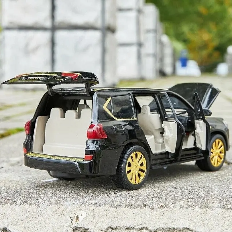 Колекційна металева модель позашляховика АвтоЕксперт Lexus LX 570 із золотими дисками, інерцією, світлом та звуком 1:24 - фото 6