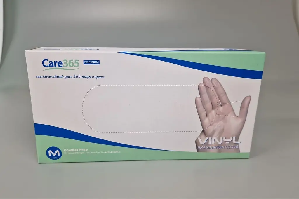 Рукавички одноразові вінілові білі CARE 365, розмір M, 100 шт, неопудрені, для огляду, клінінгу та сервісу