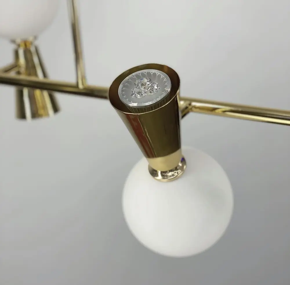 Золотая удлиненная люстра ABELINA с белыми плафонами на 2 источника света Line.F Количество ламп 6 - фото 3