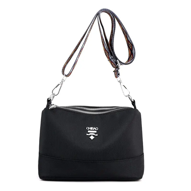 Клатч нейлоновий через плече з кольоровим ремінцем Italian Bags 24x9x16 см Чорний (id_629)
