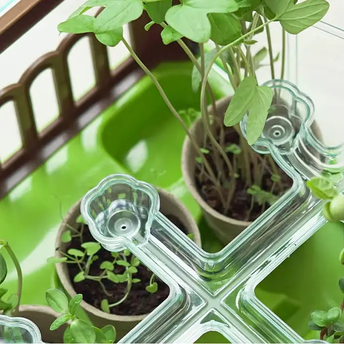 Дитяча міні теплиця Green World для рослин з прозорим дахом, підсвічуванням та поливом, набір для вирощування з насінням і горщиками - фото 7