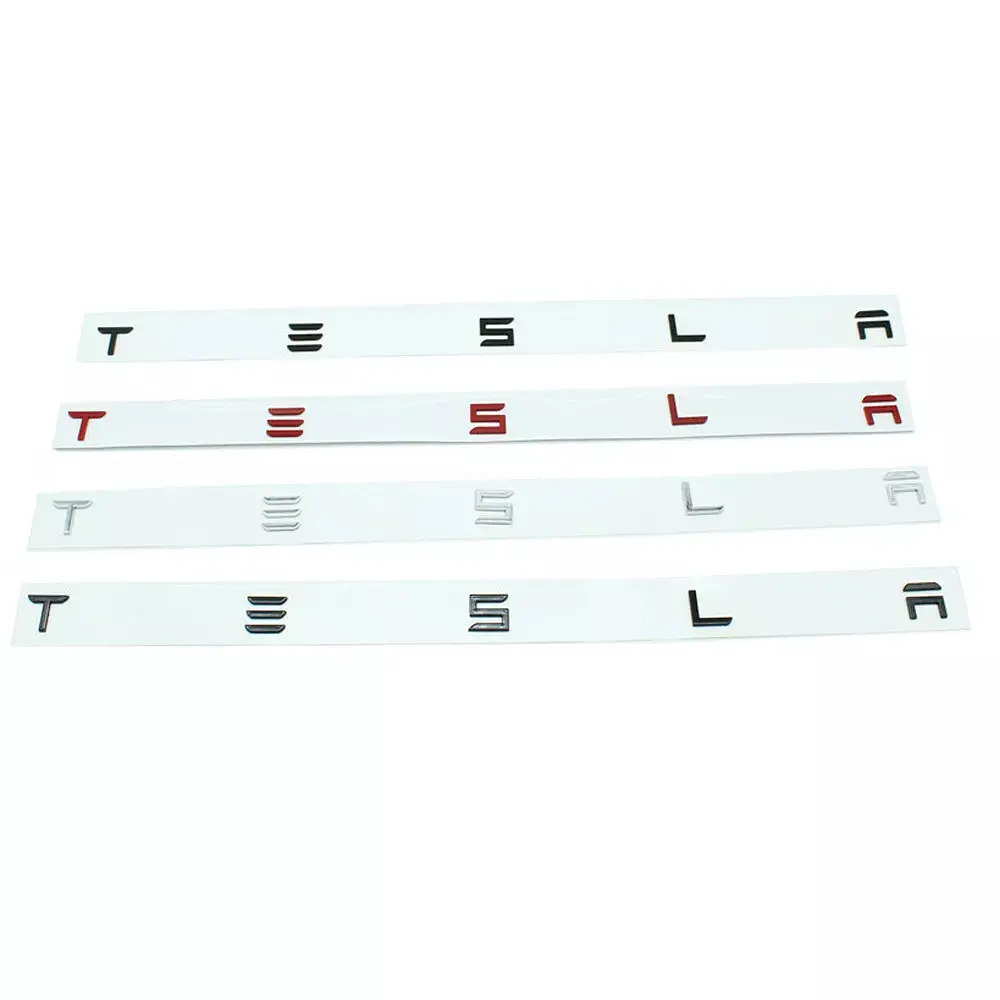 Емблема напис Tesla глянсовий Чорна Пластик на скотчі 476 × 20 мм (OEM 1880160-00-A) - фото 2