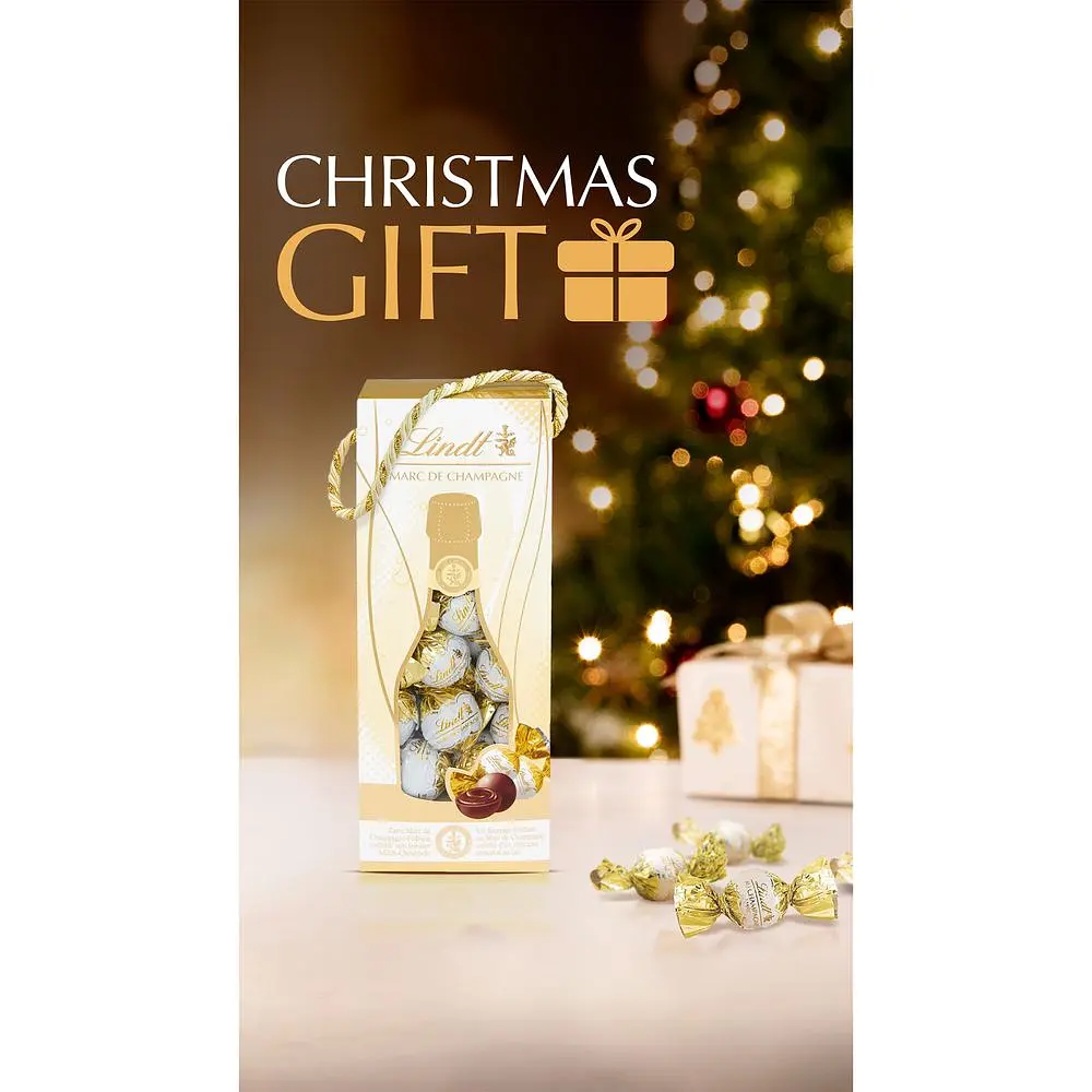 Цукерки Lindt Marc De Champagne Xmas 350 г - фото 2