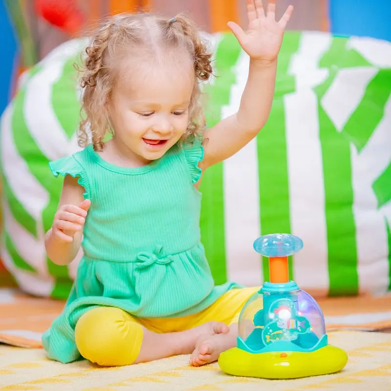 Юла музыкальная Bright Starts Press & Glow Spinner (10042) - фото 5