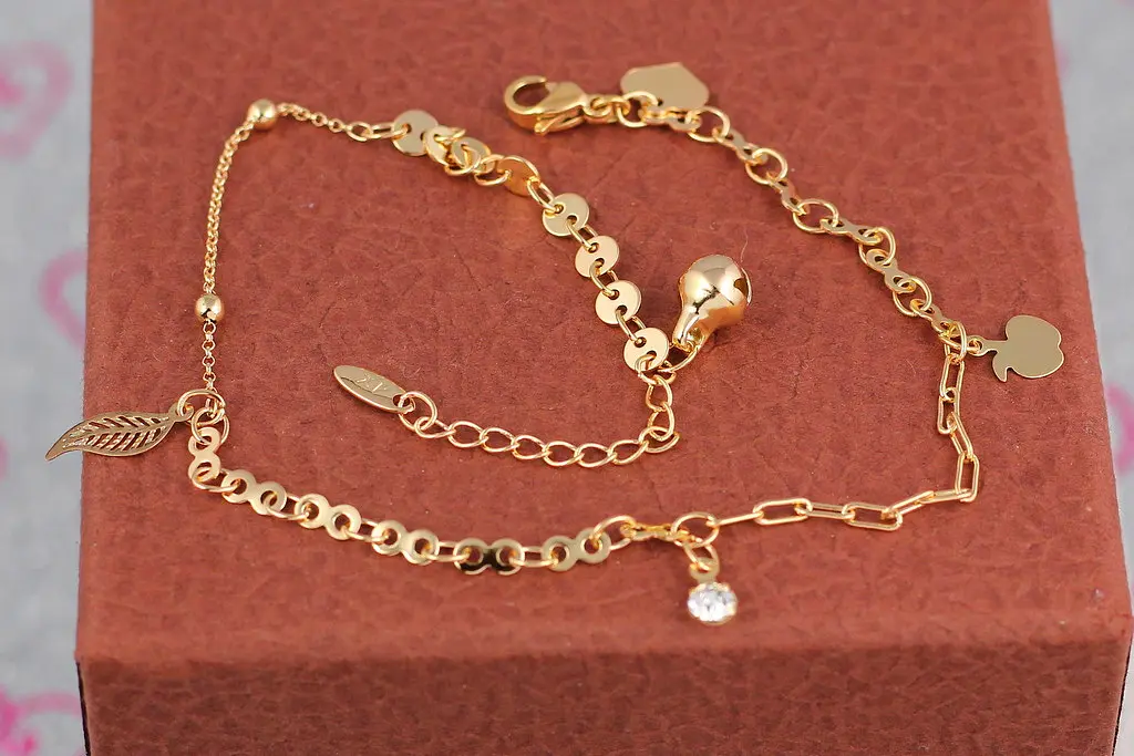 Браслет Xuping Jewelry на ногу листочок камінь яблучко 24 см домішка ланцюга 3 см золотистий - фото 2