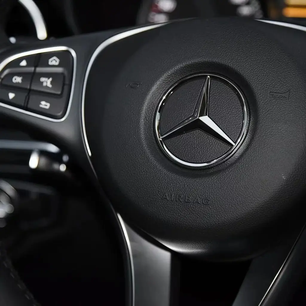 Емблема керма Mercedes-Benz чорна глянцева 57 мм пластик (на напрямних) - фото 2