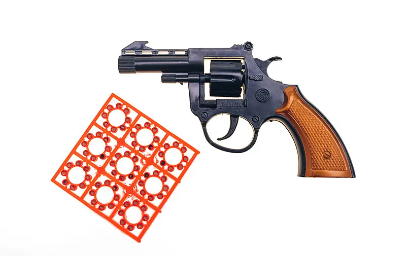Іграшковий револьвер "Кольт" Golden Gun 110 / 120GG з пістонами - фото 3