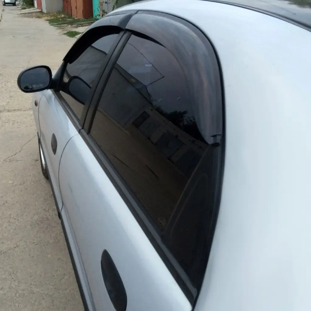 Дефлектори вікон вітровики для Daewoo Lanos 1998- Широкі 4 шт (Auto Clover) - фото 2