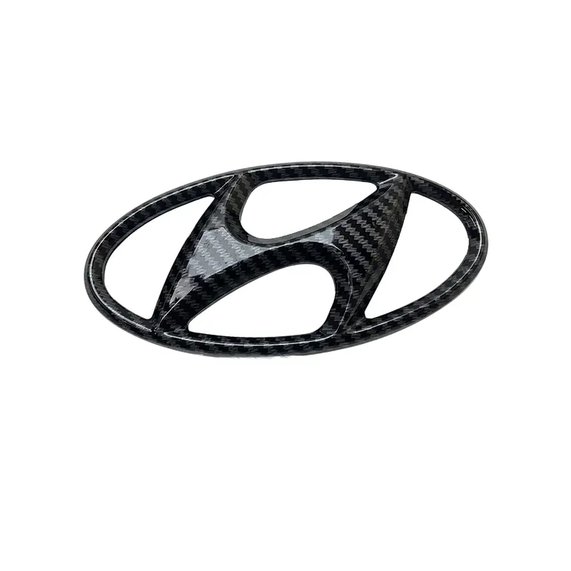 Емблема Hyundai 115х58 мм Пластик на скотчі Чорний карбон (Завод) - фото 2