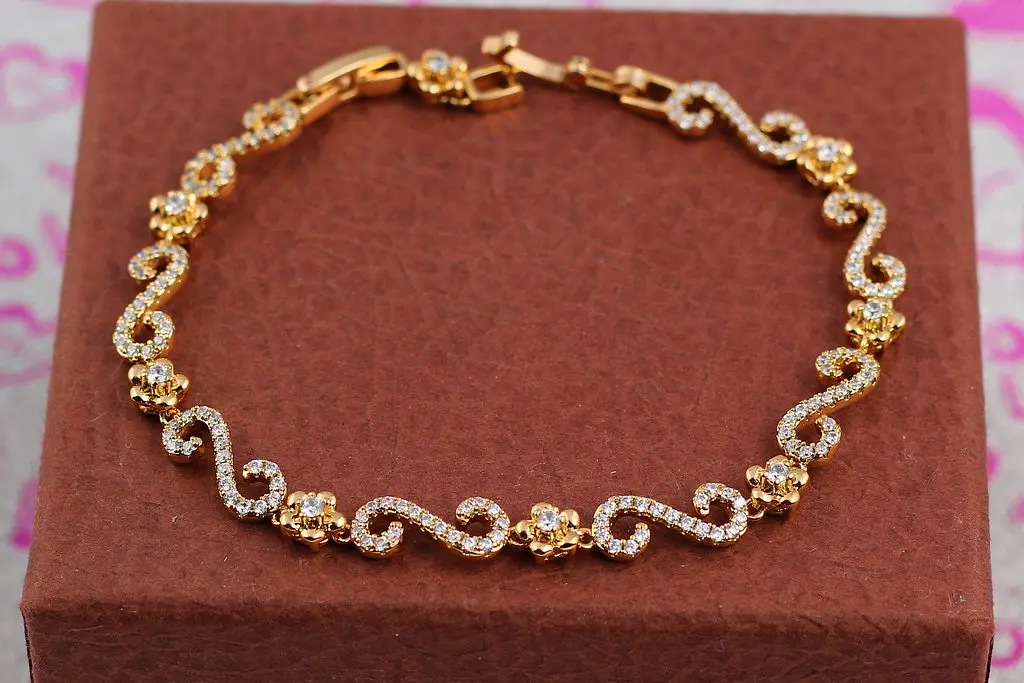 Браслет Xuping Jewelry квітковий завиток 17.5 см золотистий.