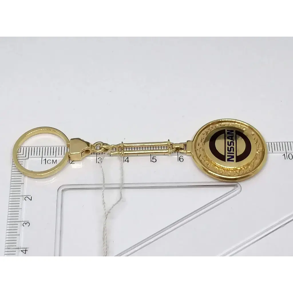 Золотий брелок NISSAN. 5221550 - фото 4