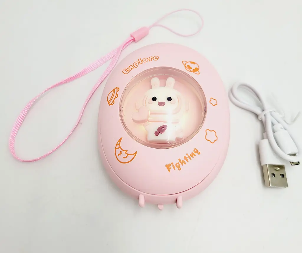 Кишенькова акумуляторна грілка обігрівач для рук нагрівач з USB зарядкою UKC AA21-1 рожевий - фото 4