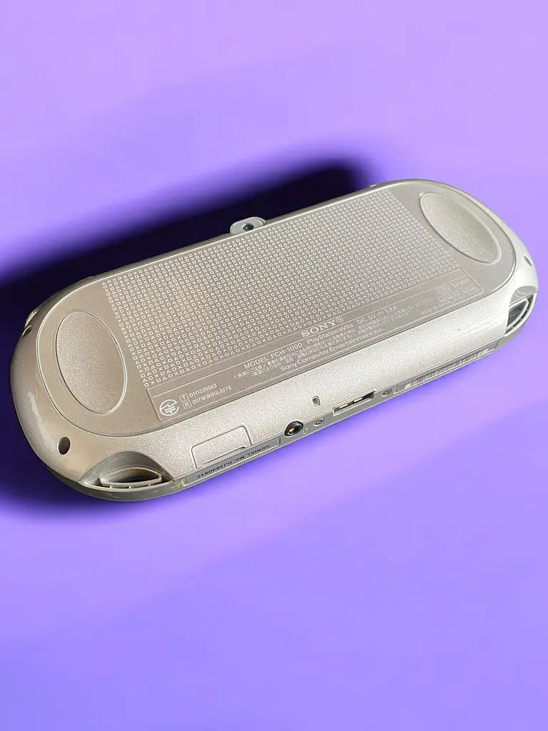 Портативна ігрова приставка кишенькова бездротова Sony Playstation Vita Fat 64 GB + 25 ігор Сріблястий - фото 2