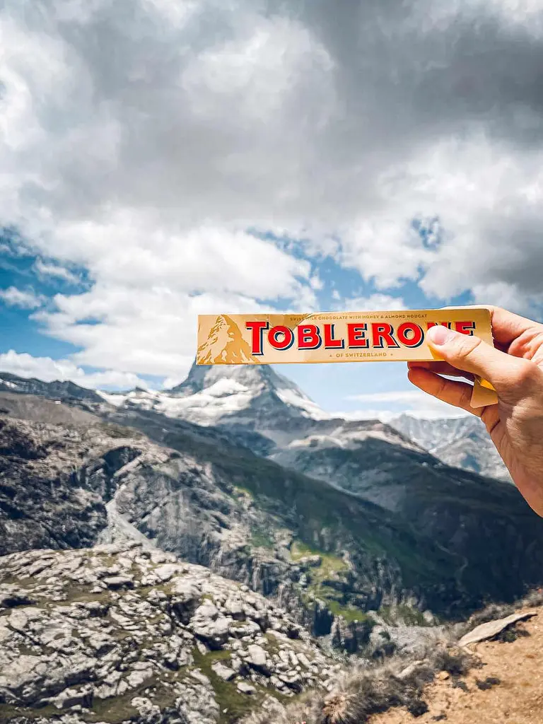 Шоколад молочний Toblerone з медом та мигдальною нугою 100г. - фото 2