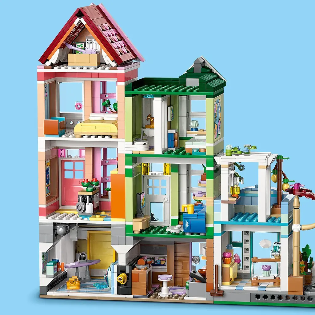 Конструктор LEGO Friends Хартлейк-Сіті. Квартири та крамниці 2040 деталей (42670) - фото 7